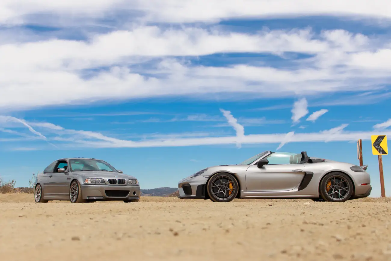 BMW M3 and Porsche Spyder at a mountain overlook above Ojai
